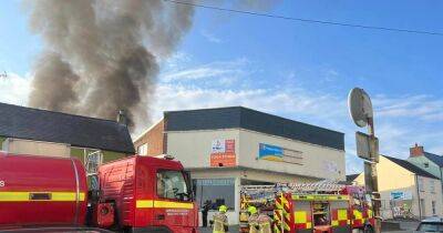 Live updates as fire service battle with major blaze at garage in Haverfordwest