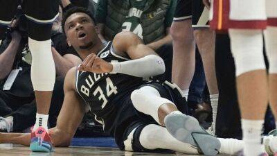 Bucks rule Giannis Antetokounmpo (back) out again for Game 3