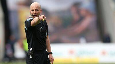 German match suspended after referee doused in beer - espn.com - Germany - Usa