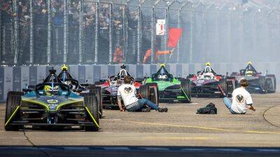 Climate change protesters briefly delay Formula E race, leaving fans scratching their heads