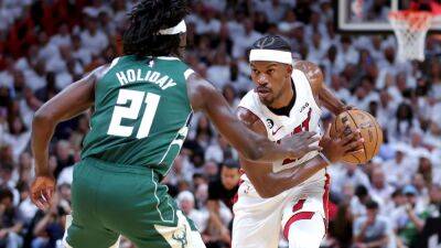 Jimmy Butler has 56 to lead Heat comeback, put Bucks on brink