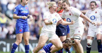England hold off France fightback to clinch Grand Slam in front of record crowd