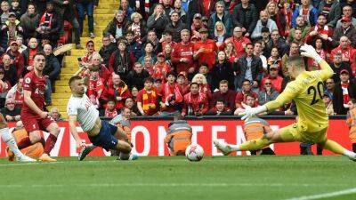 Liverpool swing bizarre seven-goal thriller at Anfield