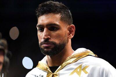 Ex-world boxing champion Khan handed 2-year ban for doping