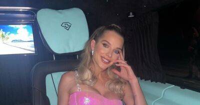 Helen Flanagan channels 'Barbie' as she dazzles in hot pink jumpsuit on 'mummy's night out' during Dubai break
