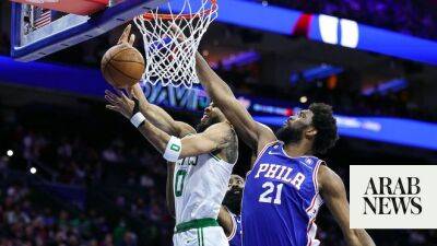 Embiid tosses in 52 as Sixers hold off Celtics, Bucks near top spot in East