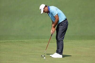 Hard toil for SA trio in Masters opening round