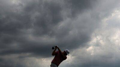 Masters dealing with inclement weather; second round twice suspended
