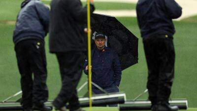 Masters: Third round suspended for the day due to rain