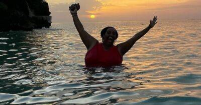 This Morning's Alison Hammond showered with praise as she slips into bright red swimsuit for sunset dip