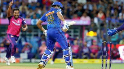 Tim David - Rohit Sharma - Rajasthan Royals - Star India - Sanju Samson - Watch: "Dismissal That Had World Talking!" IPL Posts Fresh Clear Video Of Controversial Rohit Sharma Wicket vs RR - sports.ndtv.com - India -  Sandeep -  Sanju