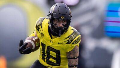 Family of late Oregon football player raises 'doubts' over paternity claim, girlfriend fires back