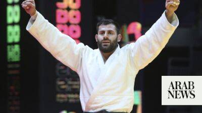 Russia’s Arman Adamian wins world judo gold under neutral flag