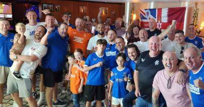 Kemar Roofe joins forces with Rangers fans in Celtic celebrations as striker enjoys derby day gloat in Qatar