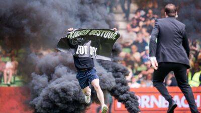 FC Groningen v Ajax abandoned after flares, protests and pitch invasion halt Eredivisie game