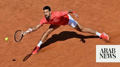 Djokovic, Swiatek into Italian Open last 16
