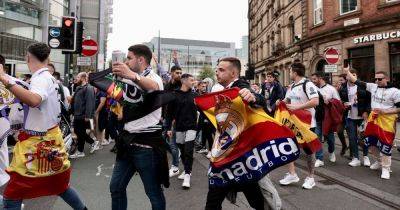 Real Madrid fans bring city centre to a STANDSTILL ahead of Manchester City game