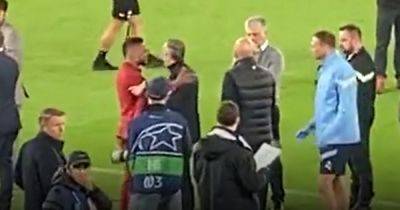 Manchester United great Patrice Evra appears to argue with Man City staff after Real Madrid win