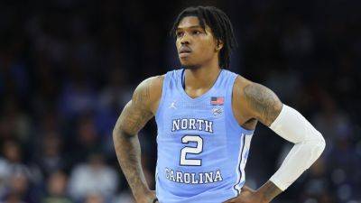 Sources - Ex-UNC guard Caleb Love decommits from Michigan - ESPN