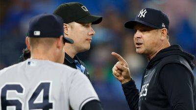 Yankees' Aaron Boone appears to shout at Blue Jays pitching coach: ‘Sit the f--- down, Pete’