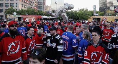 Devils fans mock Rangers supporters outside arena following Game 7 domination