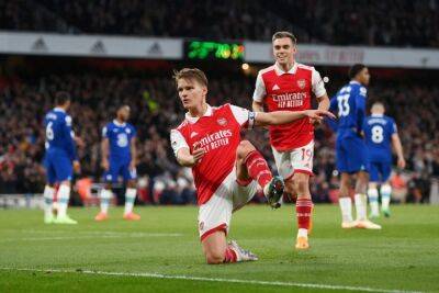Odegaard double shoots Arsenal back to Premier League summit after beating Chelsea