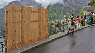 Let It Go: Austrian town that looks just like Frozen builds fence to stop selfie-taking tourists