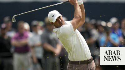 LIV Golf’s Brooks Koepka fends off challengers to win third PGA Championship