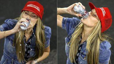 Katelyn Larson chugs beer after husband's NASCAR All-Star Race victory