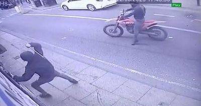Gay Village adult store Clonezone attacked for FOURTH time in two months as CCTV captures thugs on red motorbike