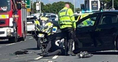 Driver ploughed into car during police chase causing huge collision before running away from scene