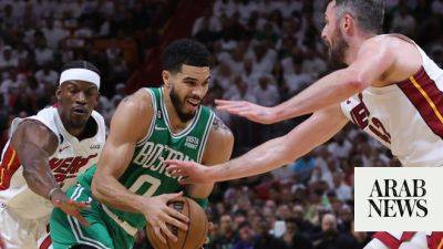 Tatum to fore as Celtics stay alive with victory at Heat