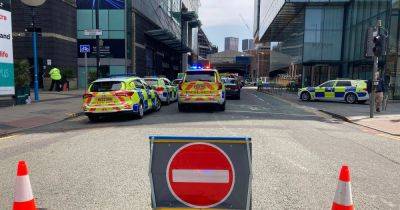 Manchester city centre street closed off as emergency services called to crash