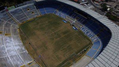 El Salvador police arrest soccer club officials after stadium stampede leaves 12 fans dead