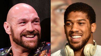 Sources -- Tyson Fury, Anthony Joshua camps discussing Sept. bout - ESPN