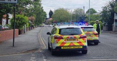LIVE: Police tape off busy junction after reports of motorbike crash - latest updates