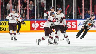 Latvia defeats U.S. in OT to win bronze at ice hockey worlds - ESPN