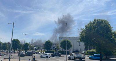 Smoke billows over Swansea as boat catches fire in marina – live updates