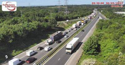 Long delays on M4 due to emergency barrier repairs near junction 47 – live updates