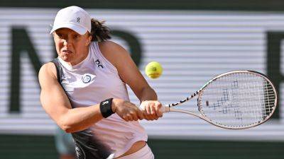 French Open: Defending champion Iga Swiatek kicks off 2023 campaign with win over Cristina Bucsa