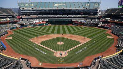 A’s fan storms field before game, runs the bases
