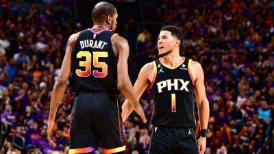Devin Booker, Kevin Durant combine for 86 points, keep Suns afloat - ESPN