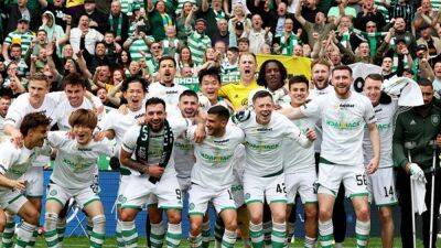 Aaron Mooy - Alex Cochrane - Celtic Beat Hearts To Retain Scottish Premiership Title - sports.ndtv.com - Scotland - Japan - South Korea
