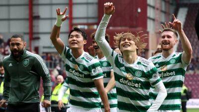 Celtic retain Scottish Premiership title after second-half surge at ten-man Hearts