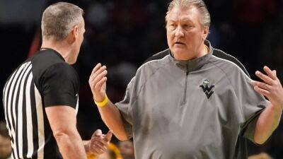 WVU reviewing incident after Huggins uses anti-gay slur on air - ESPN