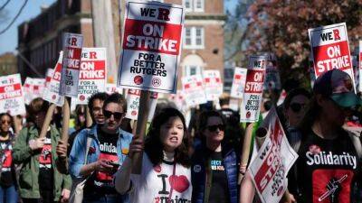 Rutgers faculty union's approve 4-year contract, formally ending strike