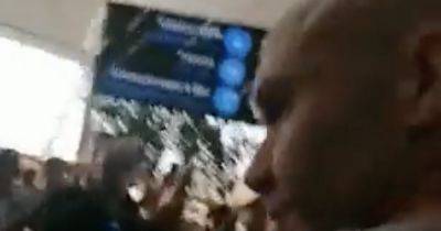 Anthony Taylor runs raging Roma fans airport gauntlet as Europa League Final referee targeted by sickening abuse