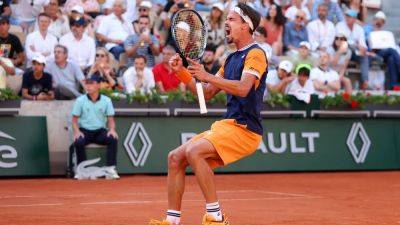 French Open: Sinner out as Altmaier prevails in five-hour epic