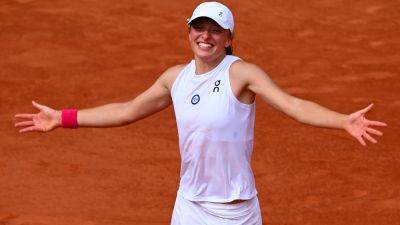 Iga Swiatek holds off stirring Karolina Muchova fightback to win French Open at Roland-Garros