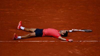History-maker Novak Djokovic claims 23rd Grand Slam title at French Open